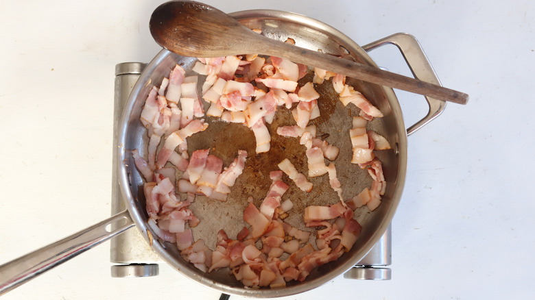 diced bacon in pan