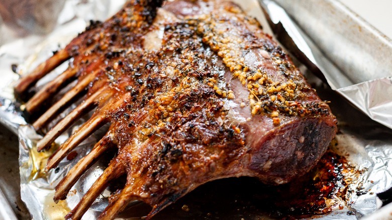 sliced lamb on white plate