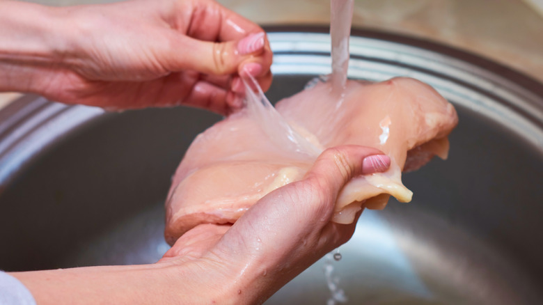 washing chicken