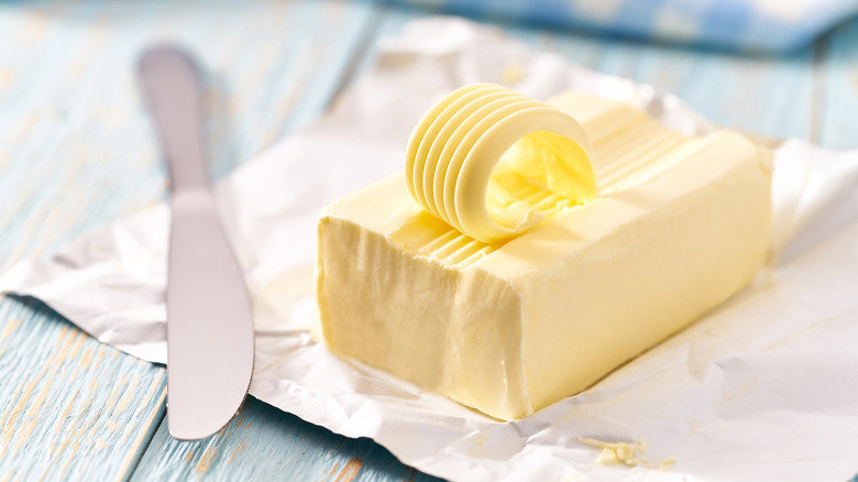 Stick of butter with knife