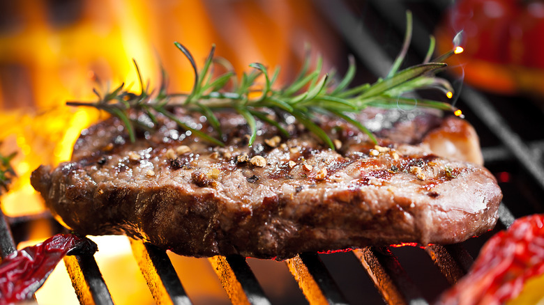 steak on the grill for dinner party