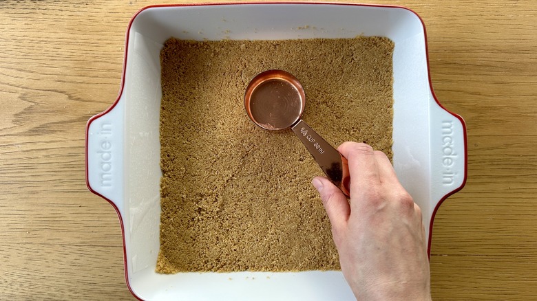 Graham cracker crust in baking dish