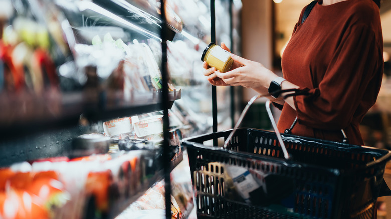 Woman shopping in supermarket