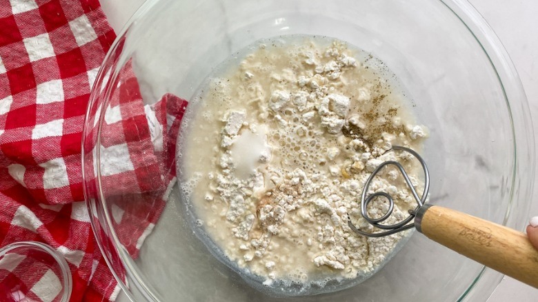 mixing dough ingredients in bowl