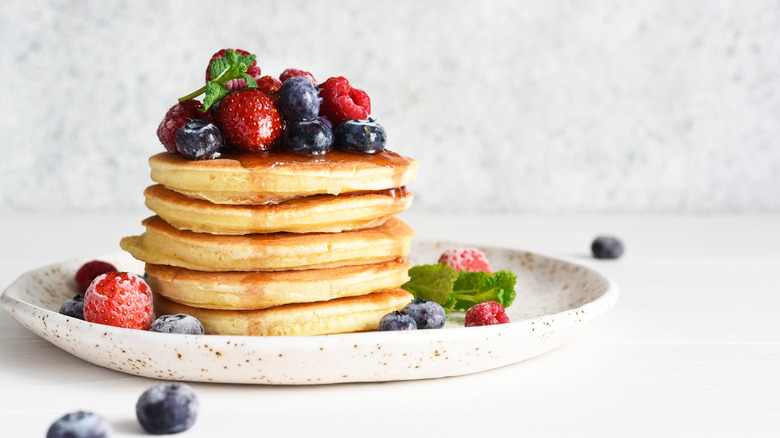 pancakes with syrup and berries