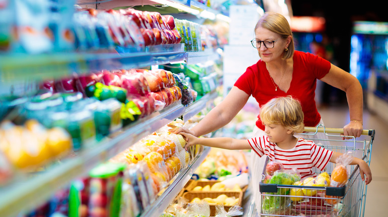 Woman shopping with a child