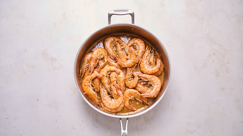 barbecue shrimp in skillet