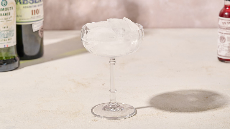 Martini glass filled with ice