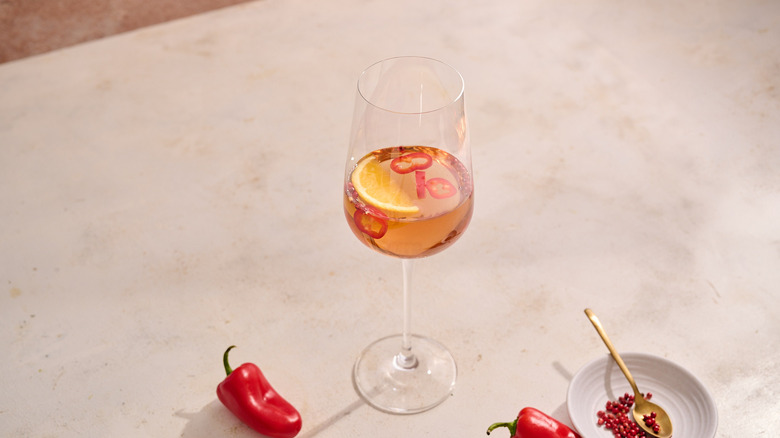 spicy rose in glass on table