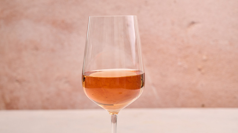 glass of rose on table