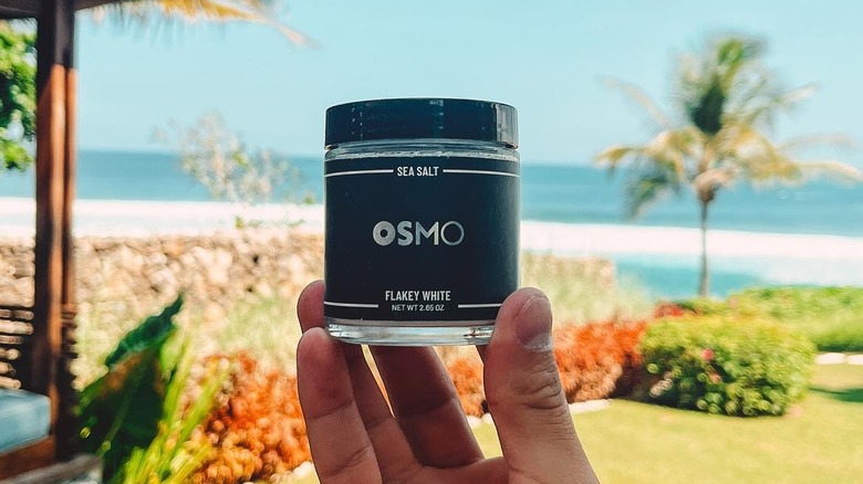holding up jar of Osmo salt