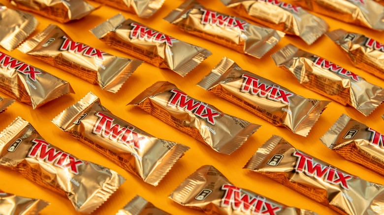 Twix bars on orange background