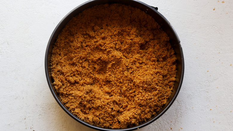 Graham cracker crumbs in pan