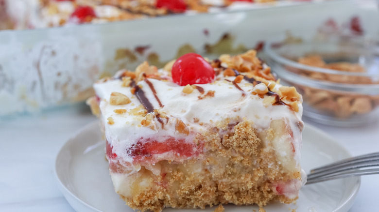 sliced no-bake banana split cake on a plate