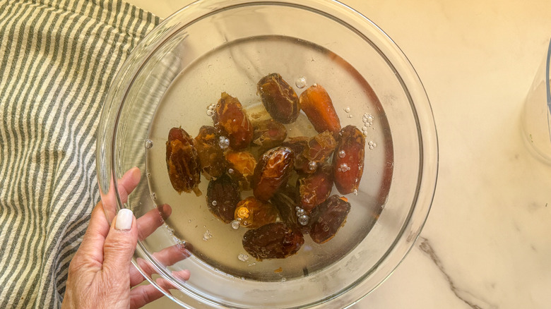 dates and water in bowl