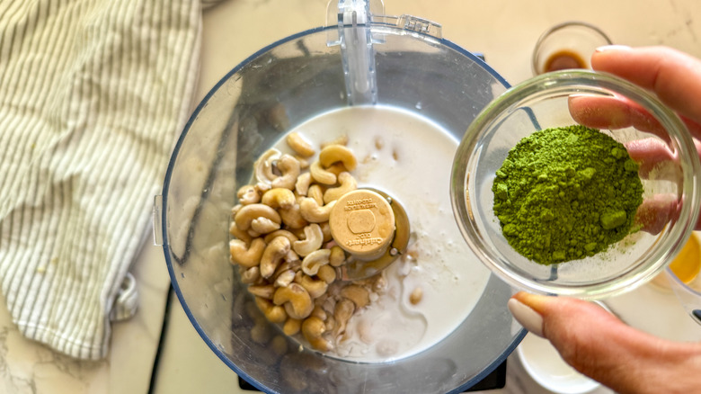 adding matcha to food processor