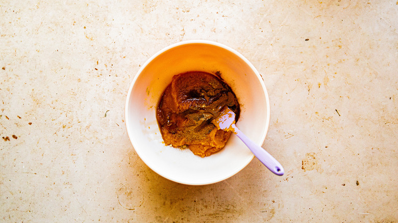 Bowl of pumpkin puree with spices