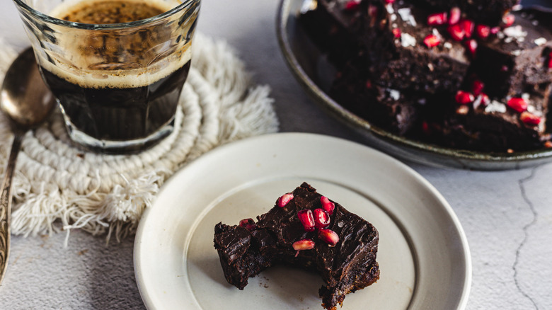 Brownie on a plate with a bite taken out