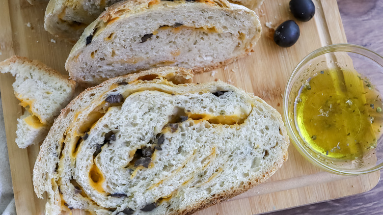 one slice of olive cheese bread