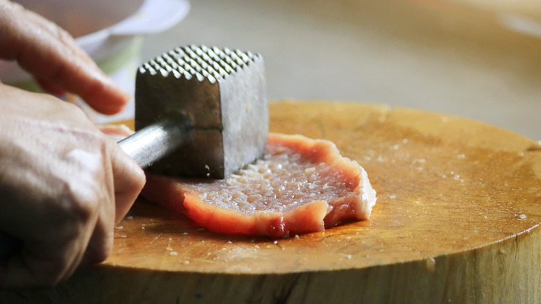 Tenderizing meat with mallet