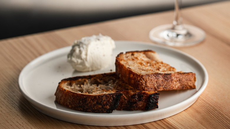 toasted sourdough bread and a mound of whipped butter