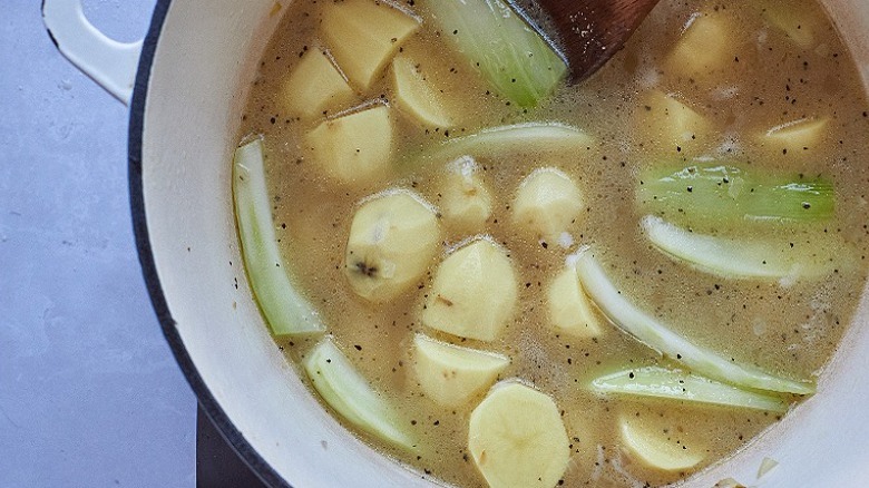 potatoes in broth in pot