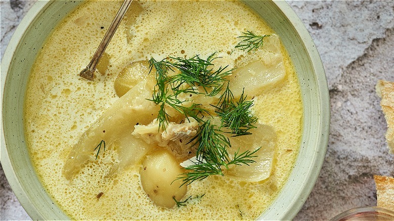 fish chowder in bowl with dill