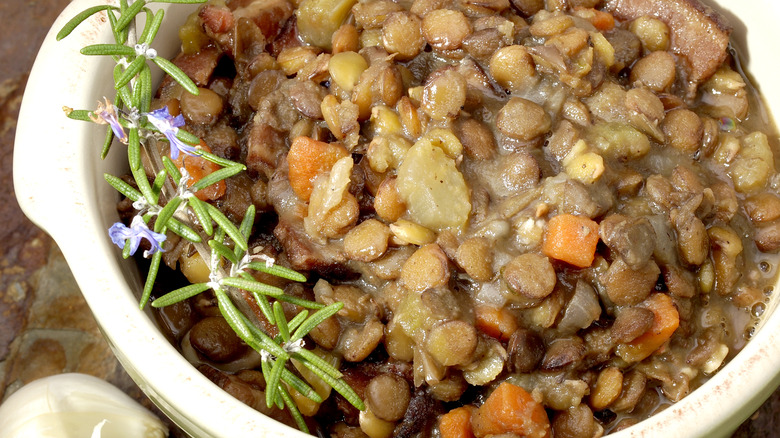 bowl of cooked lentils with rosemary 