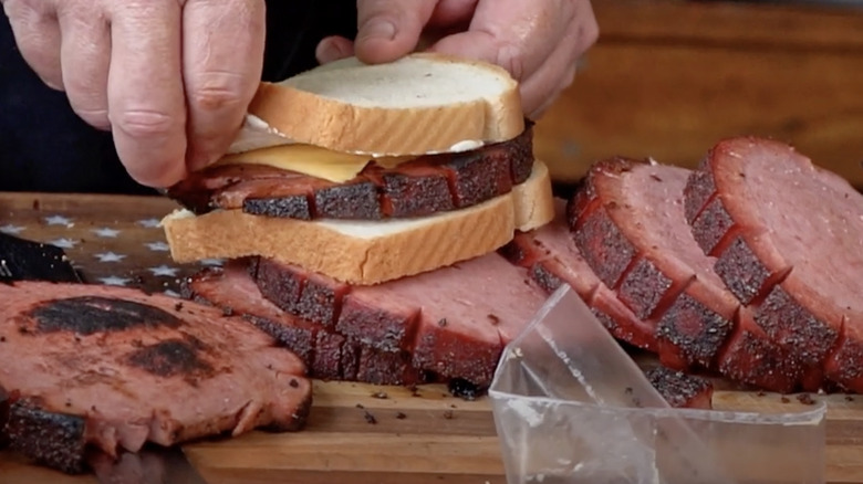 making sandwich with Oklahoma prime rib