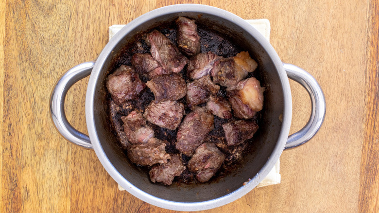 browned beef in pot