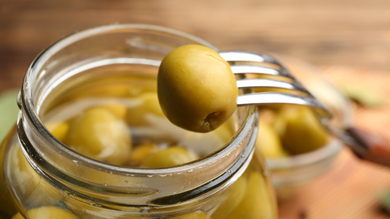 jar of olives in brine