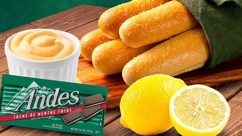 Breadsticks with sauce, Andes candy, and lemons