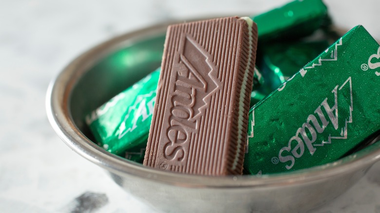 metal bowl of wrapped and unwrapped Andes Mints