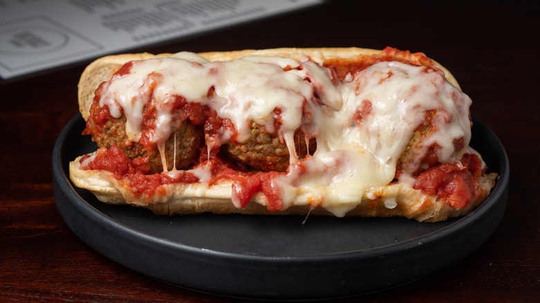 meatball sub with marinara sauce and melted cheese