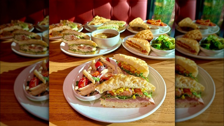 Plates of Carrabba's sandwiches on table