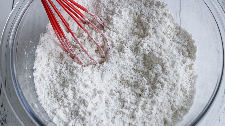 flour in bowl with whisk