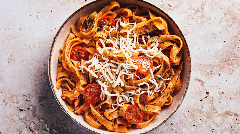 gorgeous plate of tagliatelle pasta with sauce 