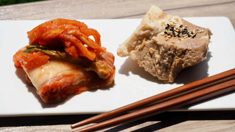 Bossam with kimchi and chopsticks