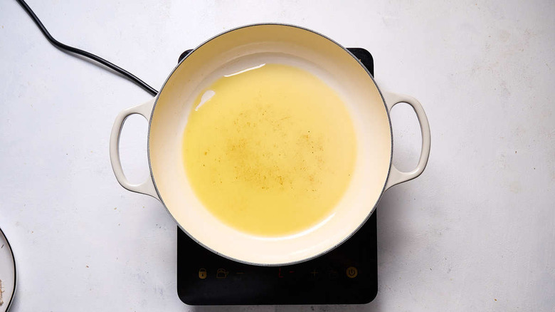 oil in white frying pan