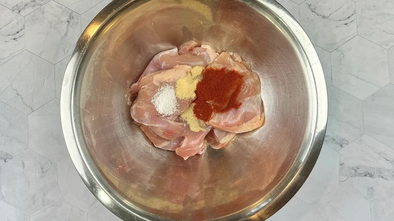 raw chicken with seasonings