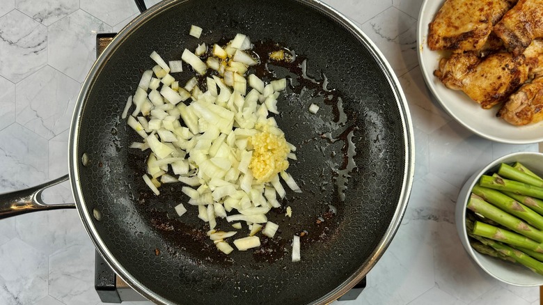 onions and garlic in pan