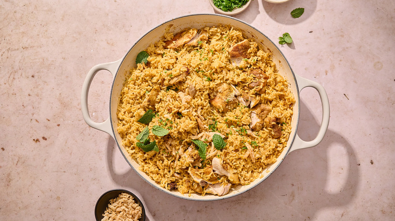 pot of chicken biryani on table