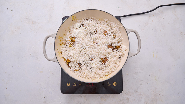 biryani ingredients in pot