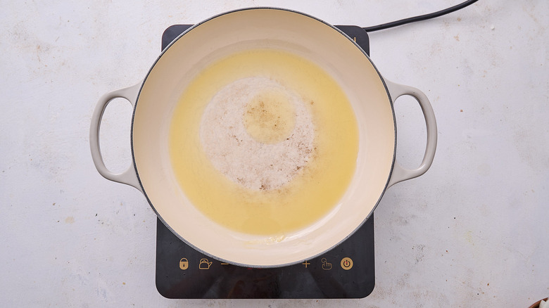 melting ghee in pot