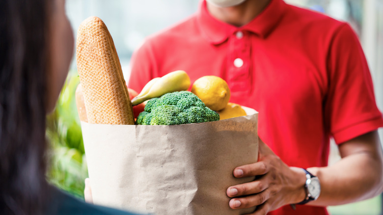 Person delivering groceries