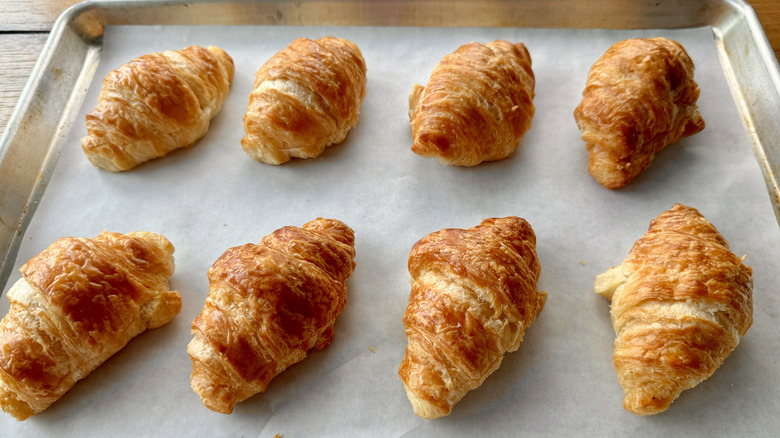 Croissants on a baking sheet