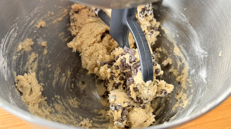 Cookie dough in mixer with chocolate chips