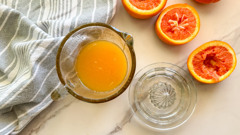 oranges juiced in glass bowl