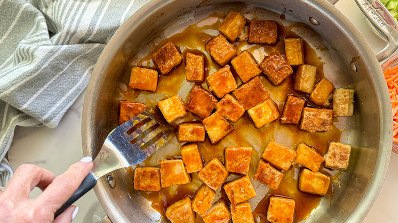 tofu in pan with sauce