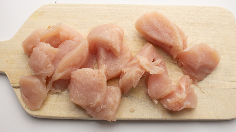 chicken chunks on wooden board